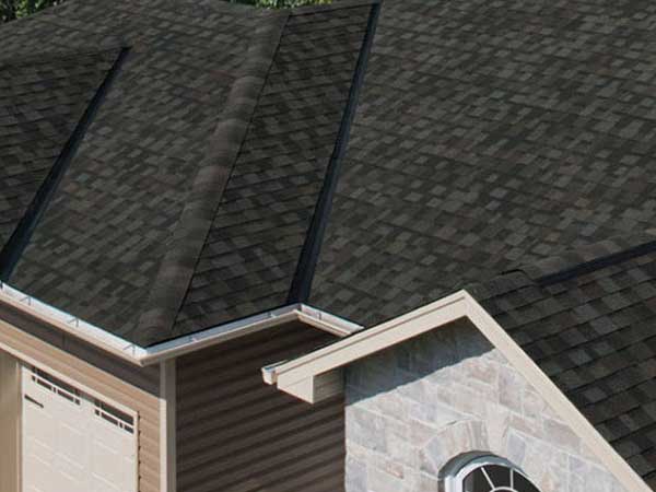 Close up of the roof of a typical mid-class home with black IKO shingles